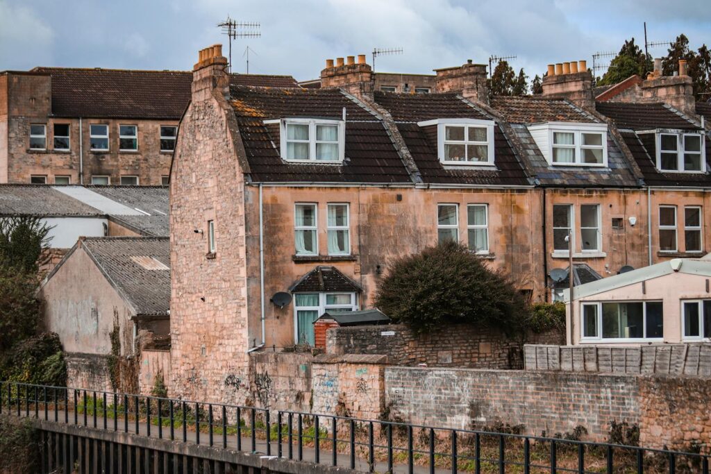 Traditional stone terraced houses in Bath, England, showcasing classic architecture.